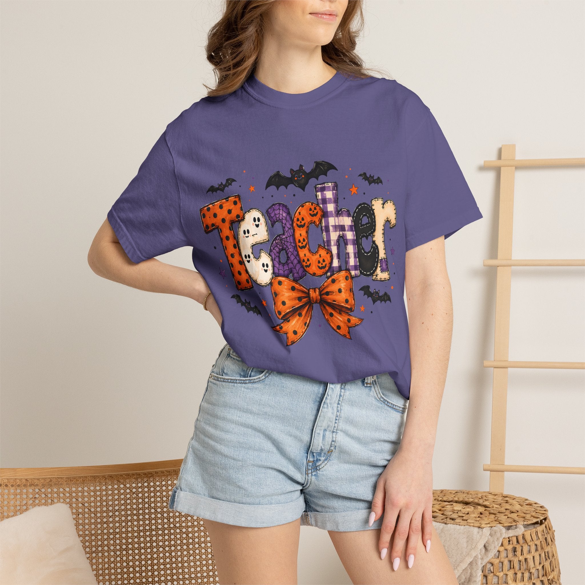 Teacher Halloween T-Shirt — Cute Spooky 'Teacher' Design with Bats & Bow