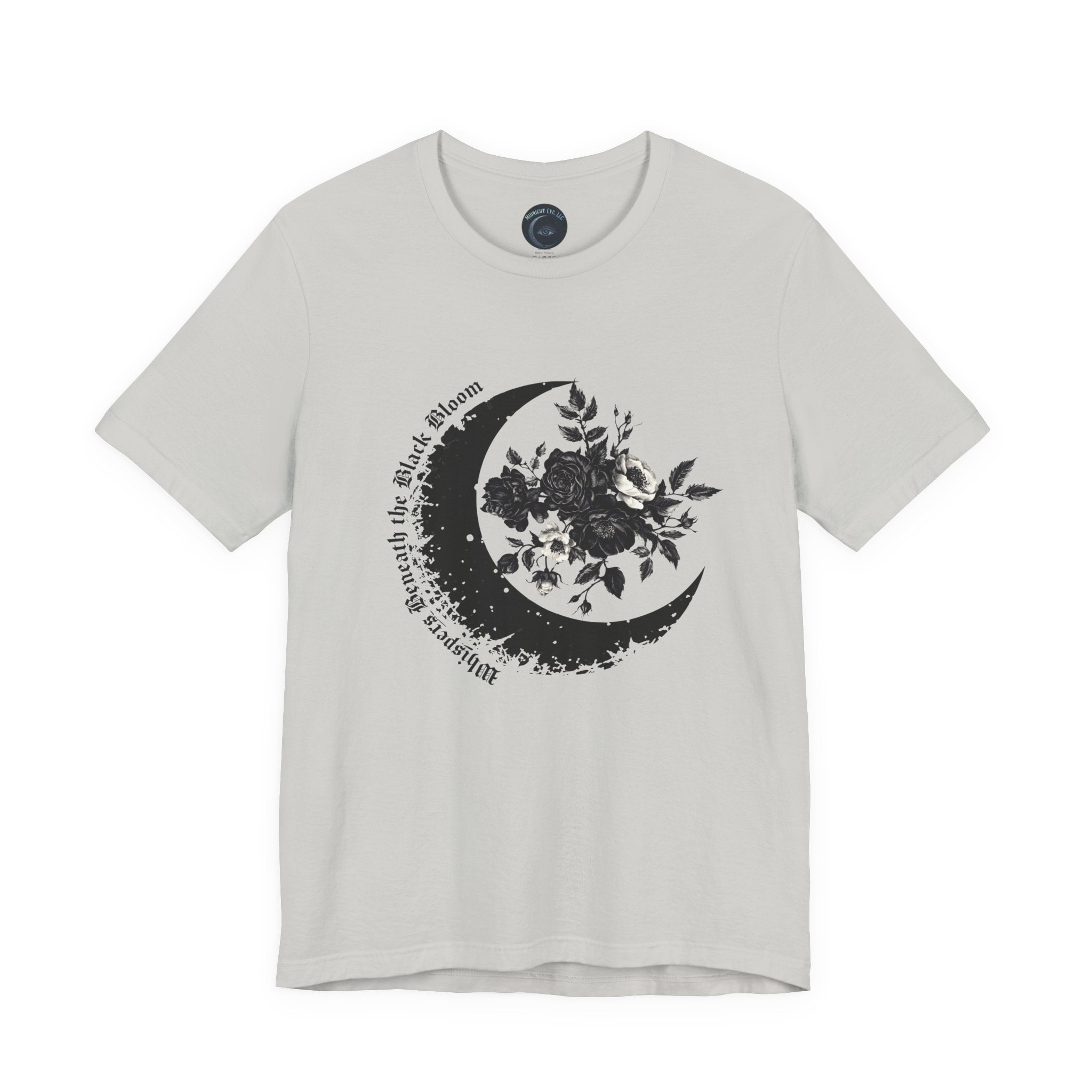 White t-shirt with black crescent moon and floral design on a white background
