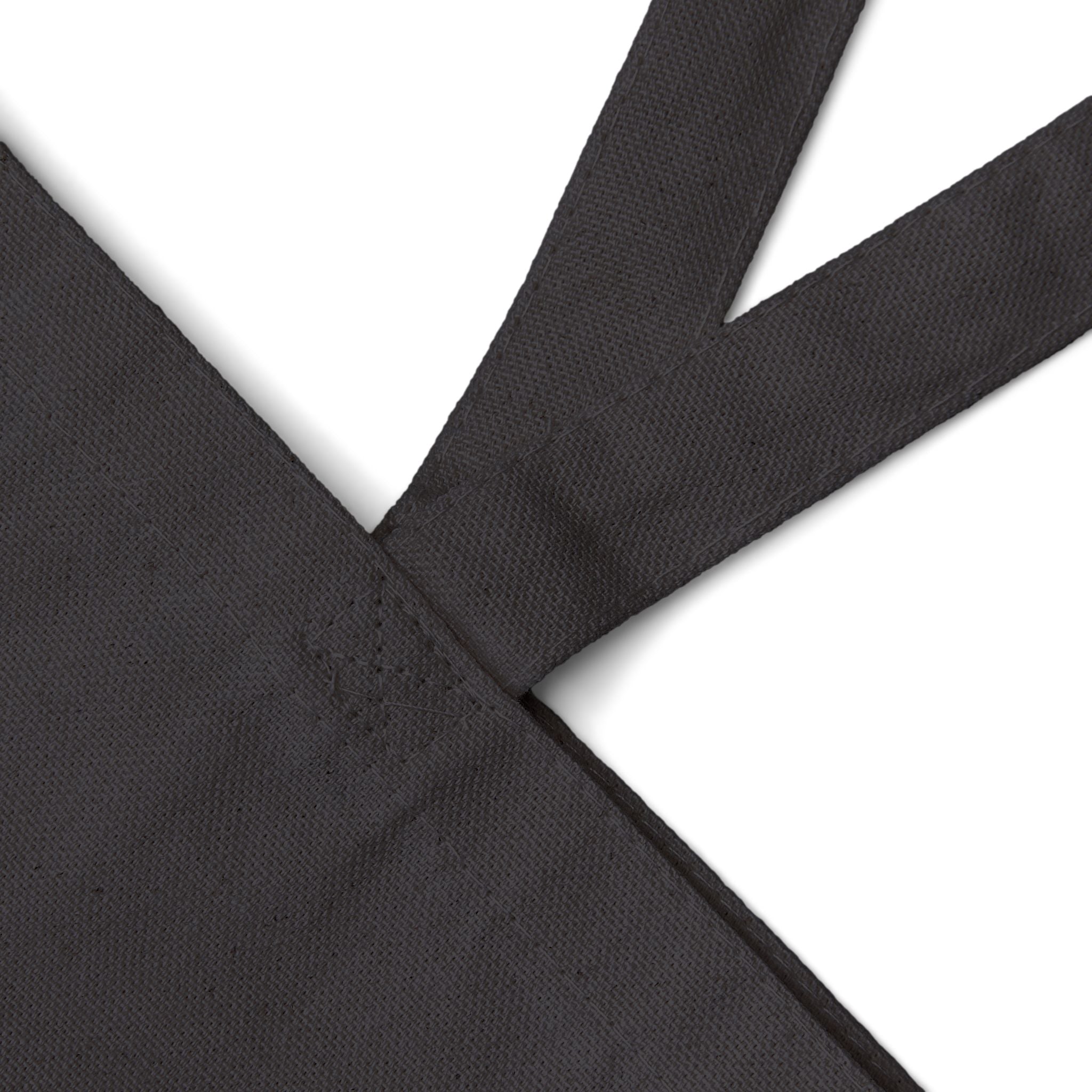 Black fabric with a subtle pattern on a white background