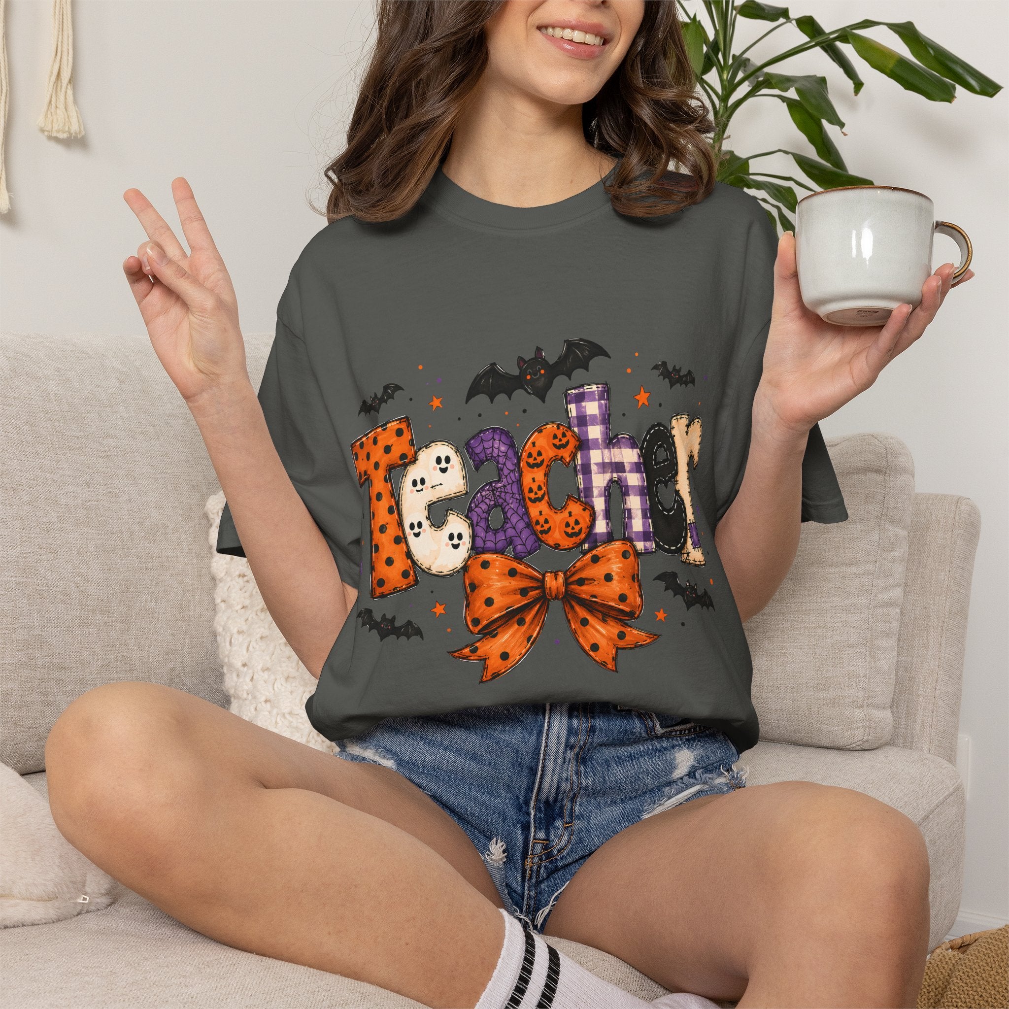Teacher Halloween T-Shirt — Cute Spooky 'Teacher' Design with Bats & Bow