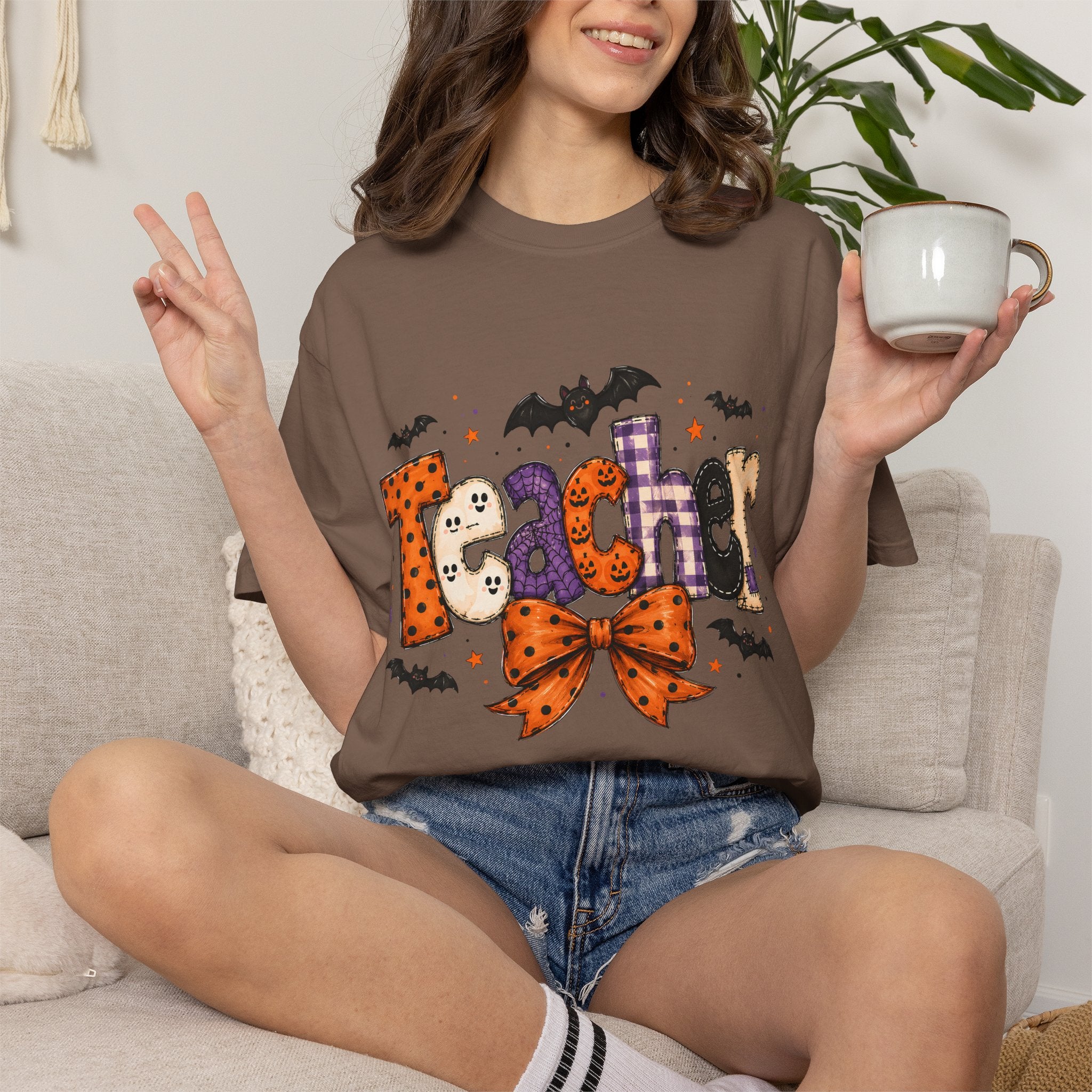 Teacher Halloween T-Shirt — Cute Spooky 'Teacher' Design with Bats & Bow
